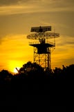 Silhouette radar tower plane and sunset royalty free stock photos Silhouette radar tower plane and sunset royalty free stock photos