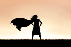 Strong Beautiful Caped Super Hero Woman Silhouette Isolated Against Sunset Sky Background