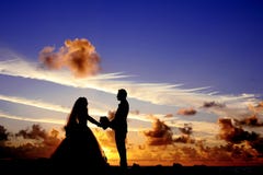 Silhouette of Wedding Couple Holding Hands Under Cloudy Blue Sky Royalty Free Stock Image Silhouette of Wedding Couple Holding Hands Under Cloudy Blue Sky Royalty Free Stock Image