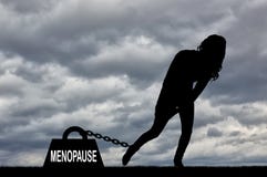 The silhouette of a woman and a heavy load of menopause is chained to her leg royalty free stock photos The silhouette of a woman and a heavy load of menopause is chained to her leg royalty free stock photos