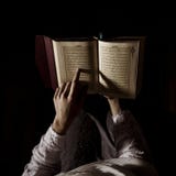 silhouette woman reading quran. High quality beautiful photo concept