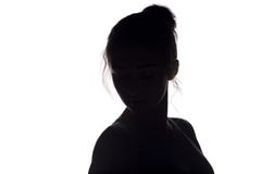 Silhouette of young woman head with hairdo on a white isolated background stock photography Silhouette of young woman head with hairdo on a white isolated background stock photography