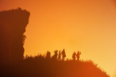 Silhouettes of so many people on top of the hills in the dark awaiting the sunrise royalty free stock photography Silhouettes of so many people on top of the hills in the dark awaiting the sunrise royalty free stock photography