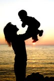 Silhouettes Of Mother And Son Partly Isolated Over Stock Photo