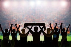 Silhouettes Of Soccer Fans In A Match And Spectators At Football Stock Image