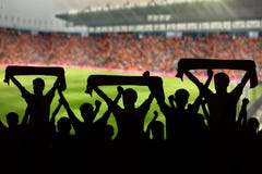 Silhouettes Of Soccer Fans In A Match And Spectators At Football Stock Images