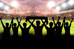 Silhouettes Of Soccer Fans In A Match And Spectators At Football Stock Photo
