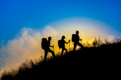 Silhouette Of Family Of Three People Walking At Sunset Stock Photo ...