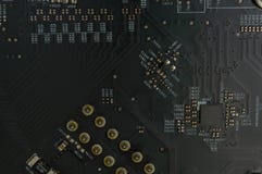 Silicon Computer Motherboard with Solder Close-up royalty free stock image Silicon Computer Motherboard with Solder Close-up royalty free stock image