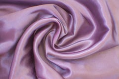 Silk wrinkled fabric of lilac color. View from above. stock image Silk wrinkled fabric of lilac color. View from above. stock image