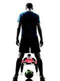 Silueta de la competencia del portero del jugador de fútbol de dos hombres foto de archivo libre de regalías Silueta de la competencia del portero del jugador de fútbol de dos hombres foto de archivo libre de regalías