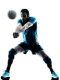Siluetta di pallavolo dell'uomo fotografia stock Siluetta di pallavolo dell'uomo fotografia stock