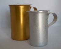 SILVERY AND GOLDEN pitcher on white background royalty free stock photos SILVERY AND GOLDEN pitcher on white background royalty free stock photos