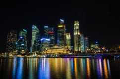 Singapore city skyline view of business district in the night ti. Me, with beautiful water reflections Stock Photo Singapore city skyline view of business district in the night ti. Me, with beautiful water reflections Stock Photo