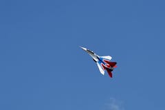 A single aerobatics of the MiG-29 aircraft on the clear blue sky of Gelendzhik. royalty free stock images A single aerobatics of the MiG-29 aircraft on the clear blue sky of Gelendzhik. royalty free stock images