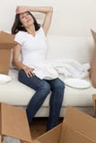 Single Woman Tired Unpacking Boxes Moving House stock photo Single Woman Tired Unpacking Boxes Moving House stock photo