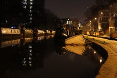 Sinking Boat at City Canal stock image Sinking Boat at City Canal stock image