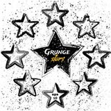 Sistema del vector de estrellas negras del grunge stock de ilustración Sistema del vector de estrellas negras del grunge stock de ilustración
