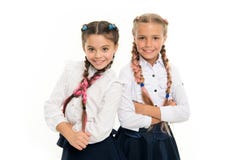 Sisters little girls with braids ready for school. School fashion concept. Be bright. School friendship. Sisterhood royalty free stock images Sisters little girls with braids ready for school. School fashion concept. Be bright. School friendship. Sisterhood royalty free stock images