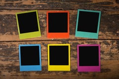 Six Color Frames On Wooden Background Stock Photo