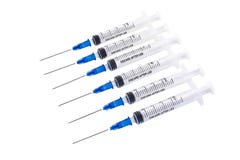 Six Medical Syringes Isolated On The White Stock Image