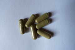 Six veggie capsules of moringa royalty free stock photos Six veggie capsules of moringa royalty free stock photos