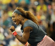 Sixteen times Grand Slam champion Serena Williams during his first round doubles match at US Open 2013 Stock Photography Sixteen times Grand Slam champion Serena Williams during his first round doubles match at US Open 2013 Stock Photography