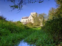 Sjukhus av St-korset och Almhouses av nobelt armod, i varmt aftonsolljus f?r h?st, Winchester, Hampshire, UK arkivfoto Sjukhus av St-korset och Almhouses av nobelt armod, i varmt aftonsolljus f?r h?st, Winchester, Hampshire, UK arkivfoto