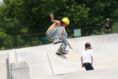 Skateboarder Flipping Board Royalty Free Stock Photo