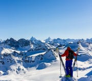Ski with amazing view of swiss famous mountains in beautiful winter snow Mt Fort. The skituring, backcountry skiing in fresh stock photo Ski with amazing view of swiss famous mountains in beautiful winter snow Mt Fort. The skituring, backcountry skiing in fresh stock photo