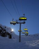 Ski lift backlit with bright sun Stock Image Ski lift backlit with bright sun Stock Image