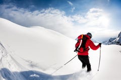 Skiing: Male Skier In Powder Snow Stock Image