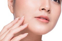 Skin care. Beautiful Young Asian Woman with Clean Fresh Skin touch her face royalty free stock photo Skin care. Beautiful Young Asian Woman with Clean Fresh Skin touch her face royalty free stock photo