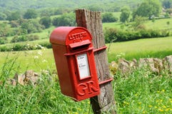 Skrzynka pocztowa w Angielskiej wsi Cotswolds obrazy stock Skrzynka pocztowa w Angielskiej wsi Cotswolds obrazy stock