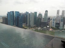 Skyscraper of Singapore. View from the infinity pool of the Marina Bay Sands. royalty free stock photography Skyscraper of Singapore. View from the infinity pool of the Marina Bay Sands. royalty free stock photography