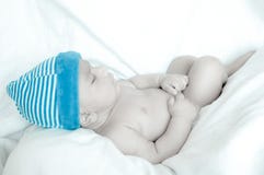 Sleeping Baby With A Cap Royalty Free Stock Image