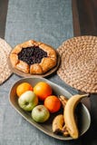 Slice of galette on a plate with tea. Homemade baking royalty free stock images Slice of galette on a plate with tea. Homemade baking royalty free stock images