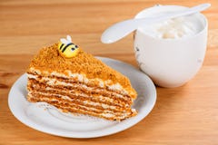 Slice Of Sweet Tasty Honey Cake Medovik With Decorative Bees And Royalty Free Stock Photography Slice Of Sweet Tasty Honey Cake Medovik With Decorative Bees And Royalty Free Stock Photography