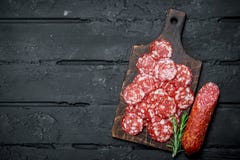 Sliced salami on the Board stock photo Sliced salami on the Board stock photo
