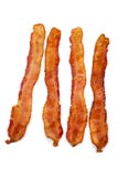 Slices Of Bacon On White Stock Photography