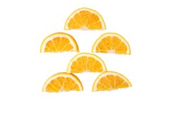 Slices of orange on a white background stock photo Slices of orange on a white background stock photo