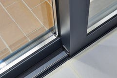 Sliding glass door detail and rail Stock Images Sliding glass door detail and rail Stock Images