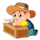 Slimme cowboy die zijn kanon en achter de doos houden royalty-vrije illustratie Slimme cowboy die zijn kanon en achter de doos houden royalty-vrije illustratie