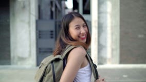 Slow motion - Asian backpacker woman feeling happy traveling in Beijing, China, cheerful beautiful young teenager blogger. stock video Slow motion - Asian backpacker woman feeling happy traveling in Beijing, China, cheerful beautiful young teenager blogger. stock video
