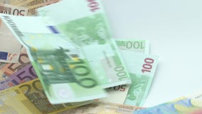 Slow motion of euros are flying and falling. Euro banknotes different values stock video footage Slow motion of euros are flying and falling. Euro banknotes different values stock video footage