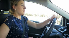 Slow motion footage of young female driver got in car accident while driving and using smartphone stock video footage Slow motion footage of young female driver got in car accident while driving and using smartphone stock video footage