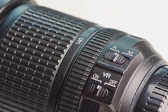 Sluit omhoog mening over stabilisatorschakelaar van een doelstelling voor camera's royalty-vrije stock foto Sluit omhoog mening over stabilisatorschakelaar van een doelstelling voor camera's royalty-vrije stock foto