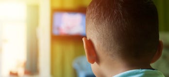 Little Boy Watching Tv royalty free stock image Little Boy Watching Tv royalty free stock image