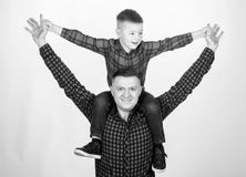 Small boy with dad man. Happy family together. childhood. parenting. fathers day. Enjoying time together. father and son stock images Small boy with dad man. Happy family together. childhood. parenting. fathers day. Enjoying time together. father and son stock images