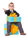 Small boy in spectecles with big present stock images Small boy in spectecles with big present stock images